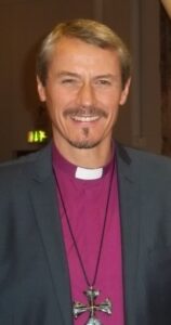 Bishop Adrian Newman wearing the Canterbury Cross