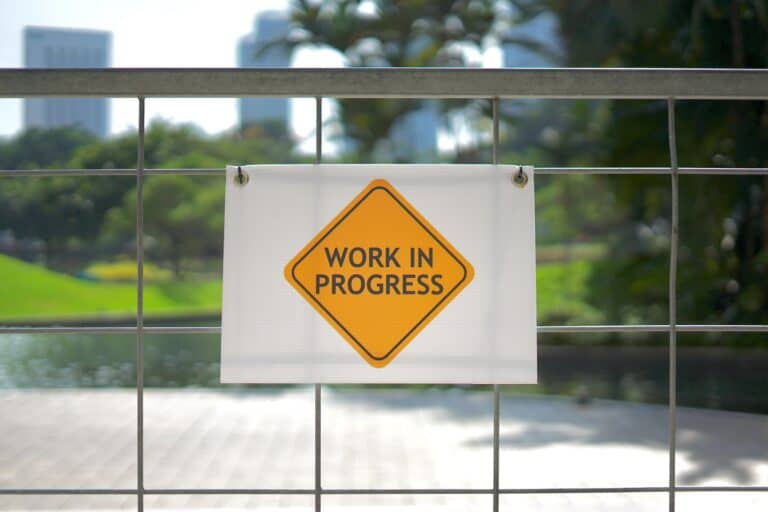 A photo of a sign saying work in progress